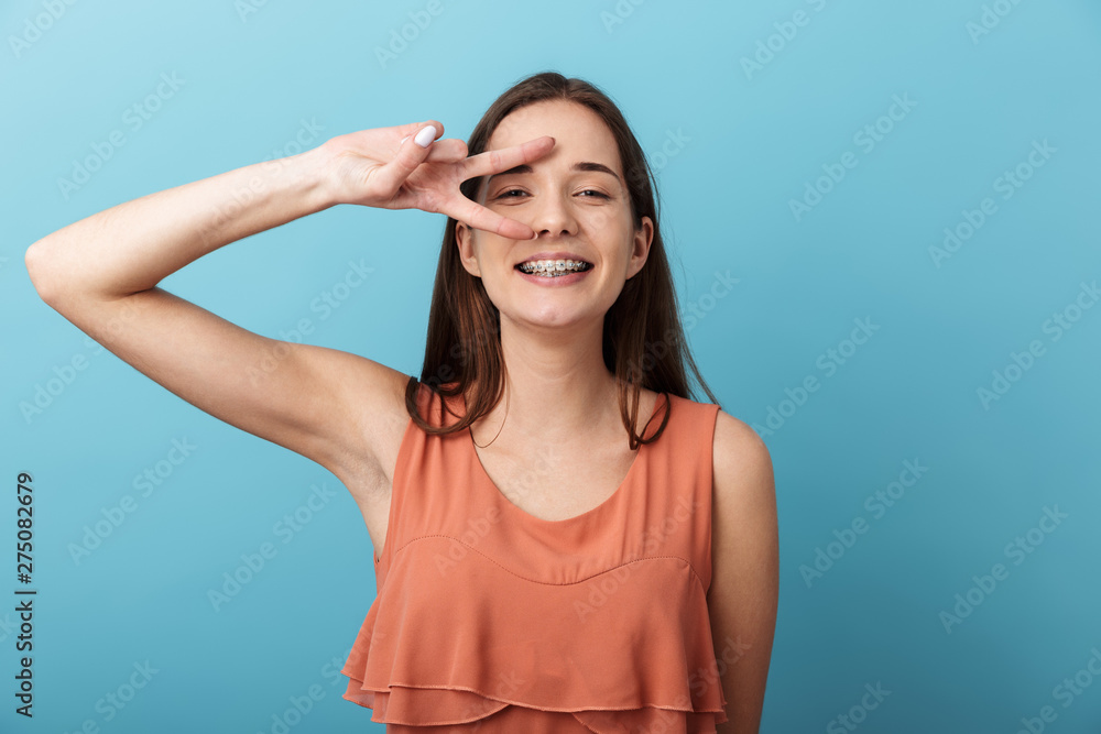 Cute lovely young girl standing isolated Cute lovely young girl standing isolated