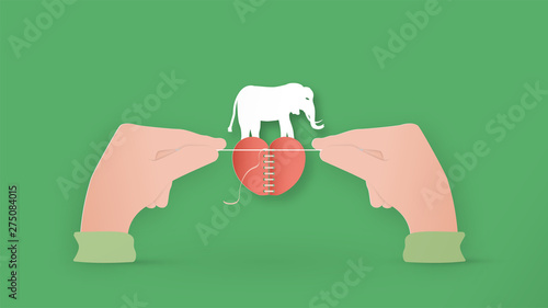 Digital craft design in concept of "Save animal wildlife". Manipulation art isolated on green background.in paper cut style.
