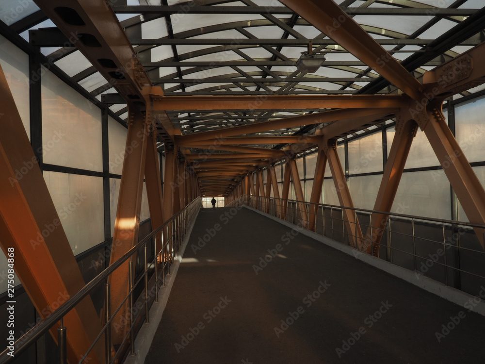 Closed overhead crossing bridge with big metal ferma rigs Closed overhead crossing bridge with big metal ferma rigs