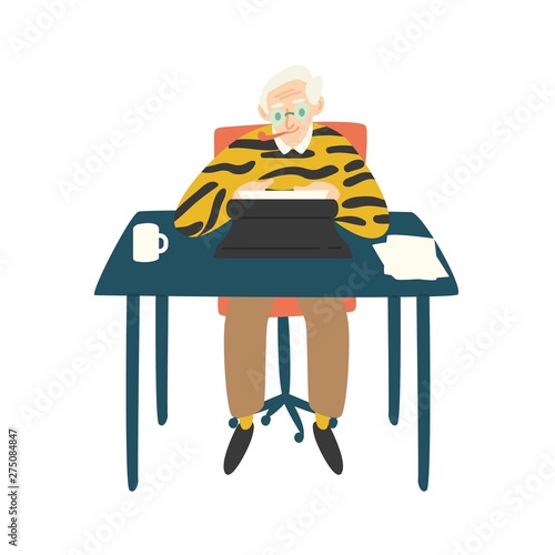 Cute elderly writer, critic or novelist siting at desk, smoking pipe and working on typewriter
