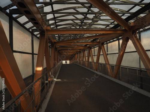 Closed overhead crossing bridge with big metal ferma rigs 