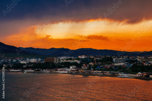 beautiful sunset and the city by the sea © snike