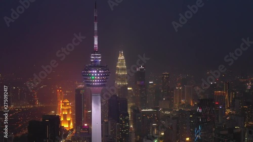 kuala lumpur city downtown night time illumination famous tower aerial panorama 4k malayisa photo