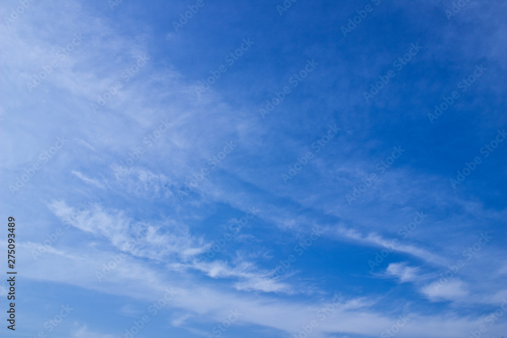 Blue sky with cirrus clouds on a summer day. Summer in Russia.
