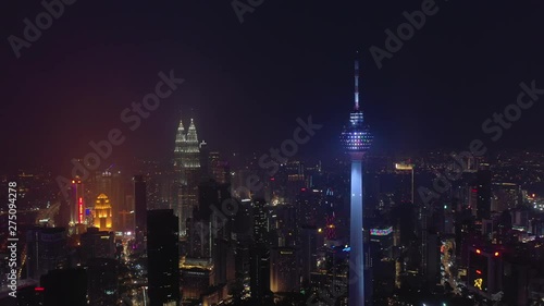 kuala lumpur city downtown night time illumination famous tower aerial panorama 4k malayisa photo