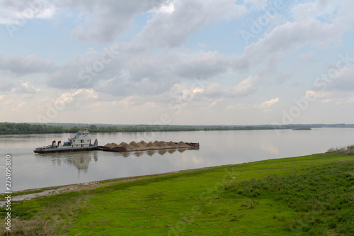 sand barge on the river