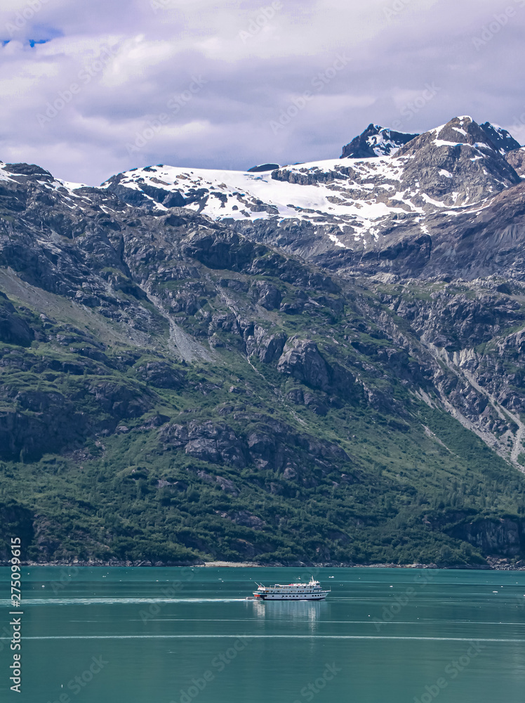 Cloudy skies over mountains in Glacier Bay