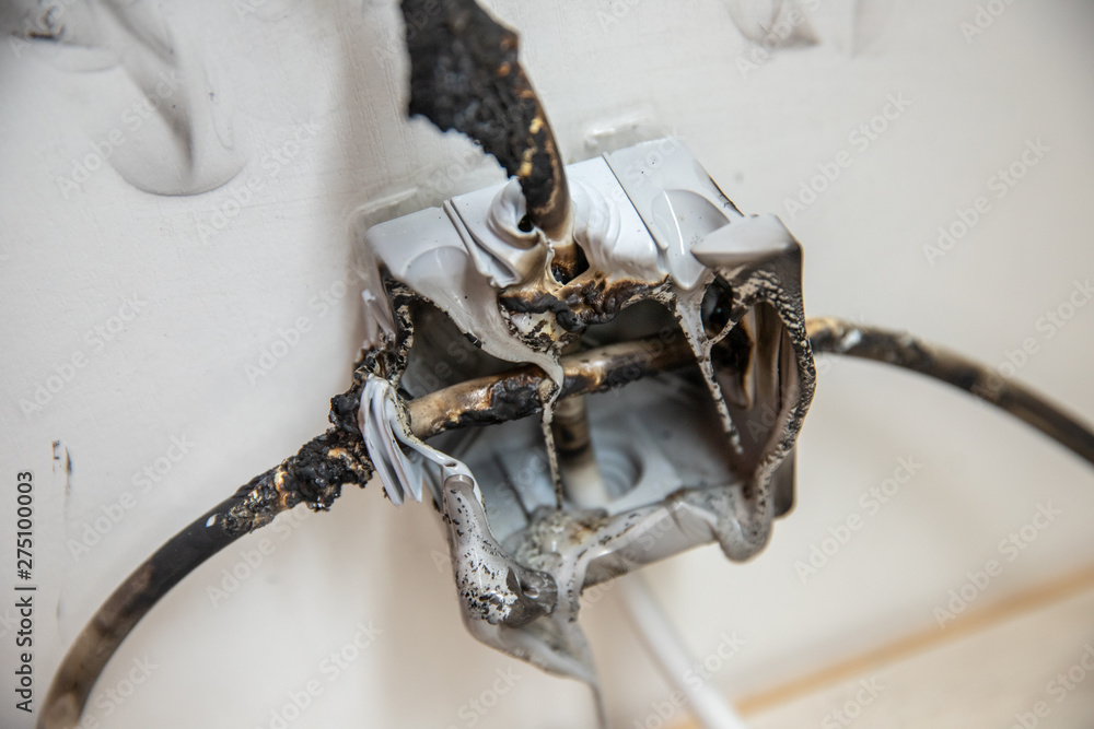 Electrical short circuit Effects. Failure caused by burning wire and  rosettes socket plug in house Photos | Adobe Stock
