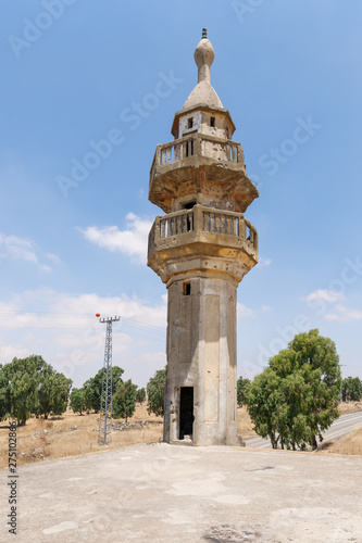 The ruined mosque Horvat Khushniya with the minaret remaining after the war of the Judgment Day (Yom Kippur War) on the Golan Heights, near the border with Syria in Israel photo