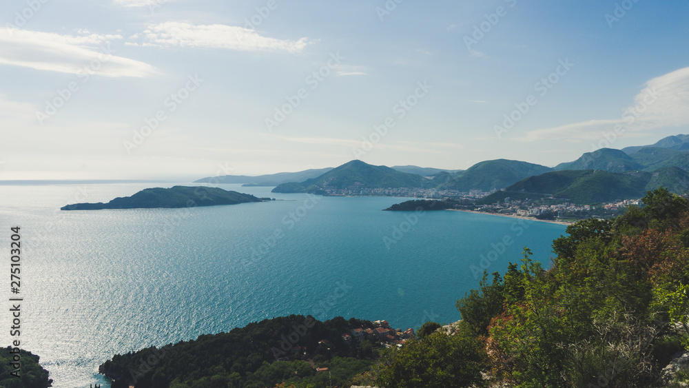 Panoramic landscape of the rocky coastline sea and Beach. Budva, Montenegro. Top view. View from the top of the mountain.