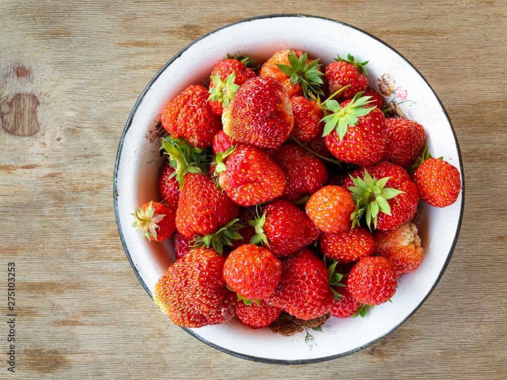 Top view on metallic pan with fresh organic strawberries Top view on metallic pan with fresh organic strawberries