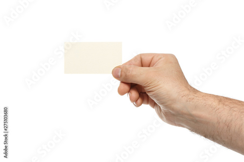 Male hand is holding a blank business card isolated on white background.