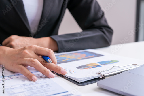 Businessman or Manager work with financial paper report, business planing and analysis of growth concept.