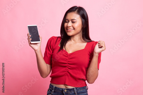 Happy Young Asian woman with mobile phone.