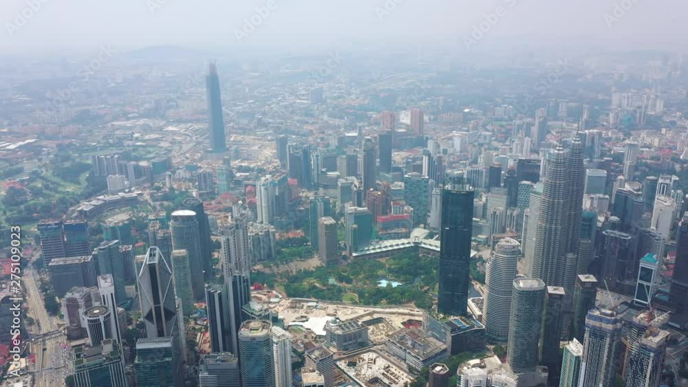 kuala lumpur city downtown famous towers sunny day aerial panorama 4k malaysia kuala lumpur city downtown famous towers sunny day aerial panorama 4k malaysia