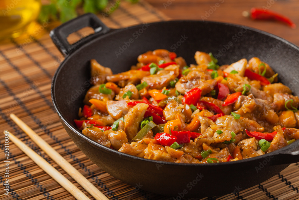 Chicken kung pao. Fried chicken pieces with peanuts and peppers. Chicken kung pao. Fried chicken pieces with peanuts and peppers.