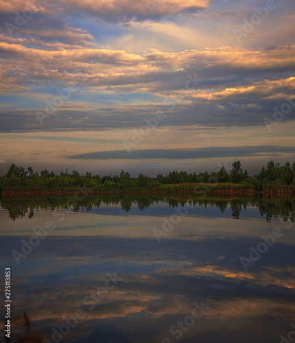 On the lake in the evening before sunset