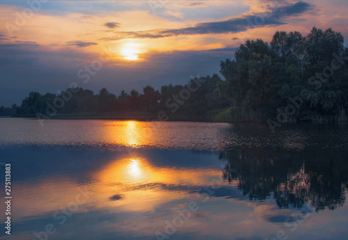 On the lake in the evening before sunset