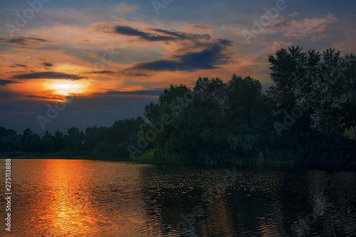 On the lake in the evening before sunset
