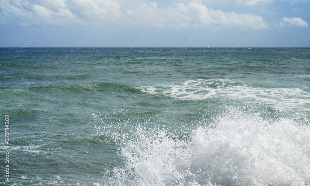 waves breaking on beach