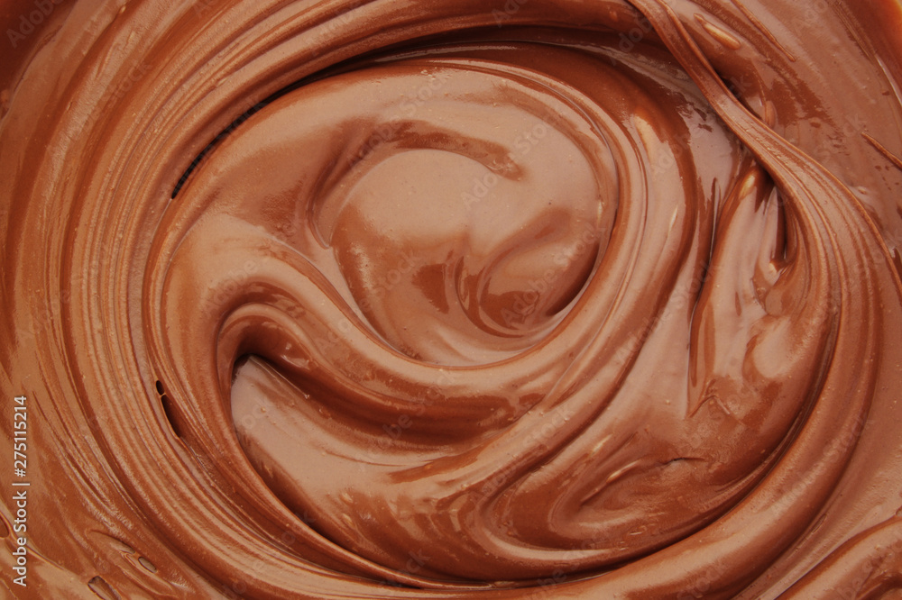 Chocolate spread as background, melted chocolate pattern Chocolate spread as background, melted chocolate pattern