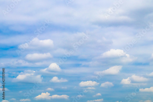Abstract background of blue sky with gentle clouds