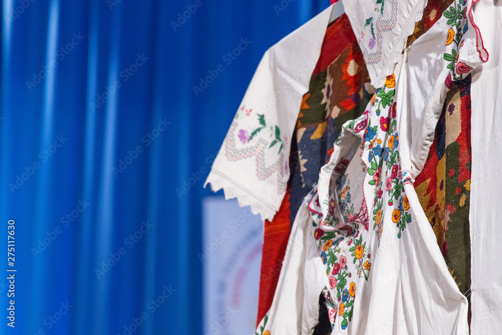 Detail of traditional folkloric costume of Romanian dancers. Folklore of Romania