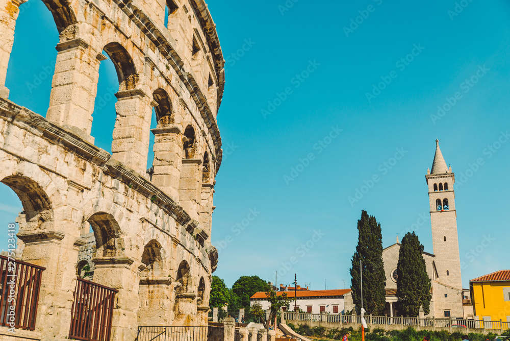view of old roman coliseum in pula city