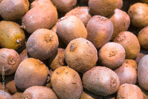 delicious exotic kiwi fruit on the supermarket counter