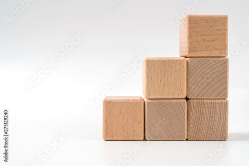 wood cube arrange in pyramid shape  business concept
