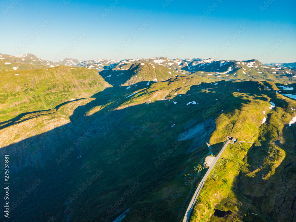 Road with tunnel in mountains Norway. Aerial view.