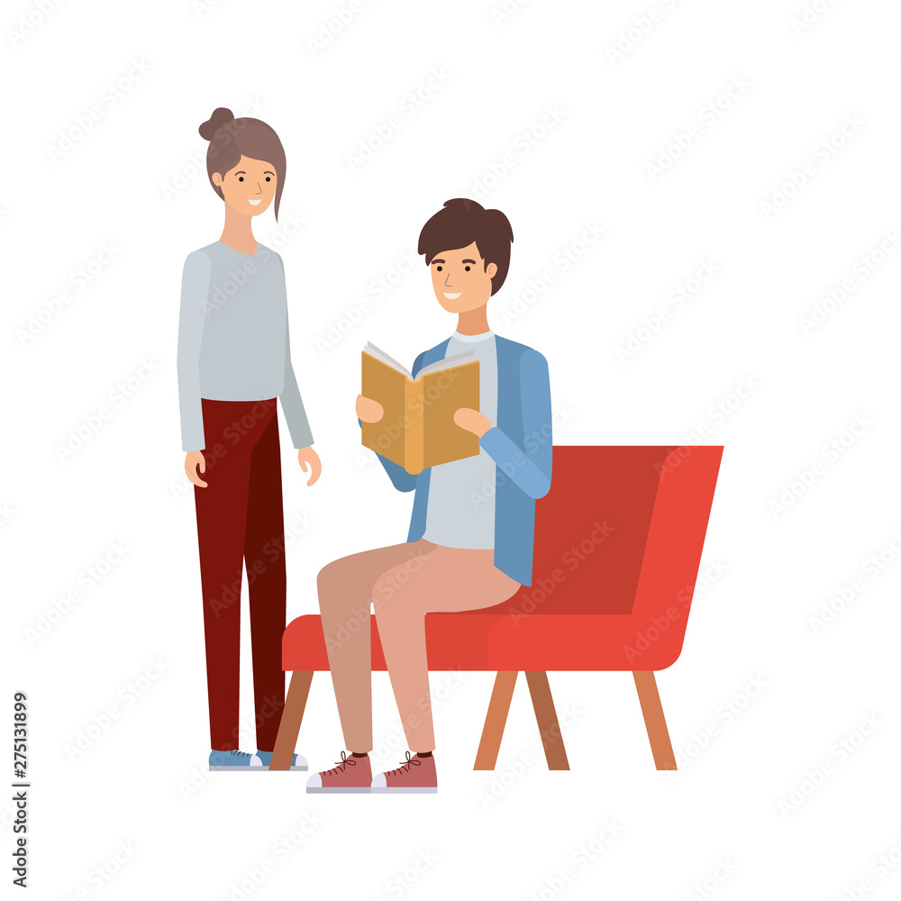 couple sitting on chair with book in hands couple sitting on chair with book in hands