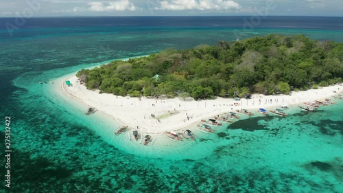 Wallpaper Mural Aerial drone view of a tiny, beautiful tropical island with sandy beach, lush forest and coral reef (Mantigue Island, Camiguin) Torontodigital.ca