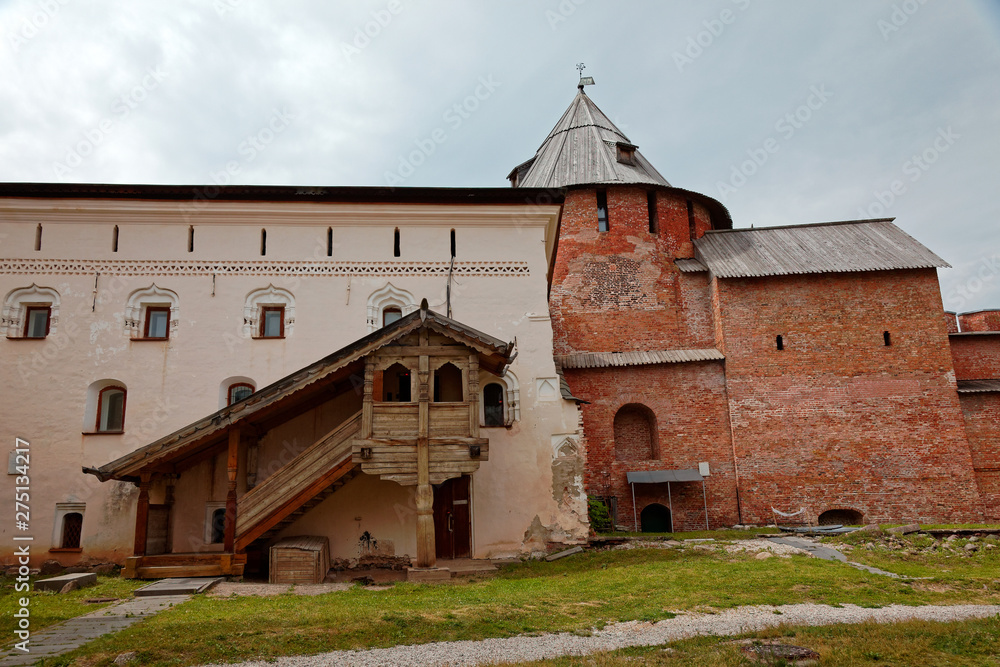 The walls of the Old Town and the towers of Veliky Novgorod, Russia. Wooden porch