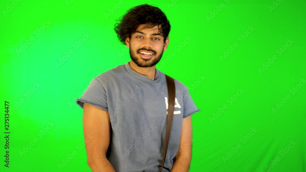 indian tourist is walking on road with green background / green screen indian tourist is walking on road with green background / green screen