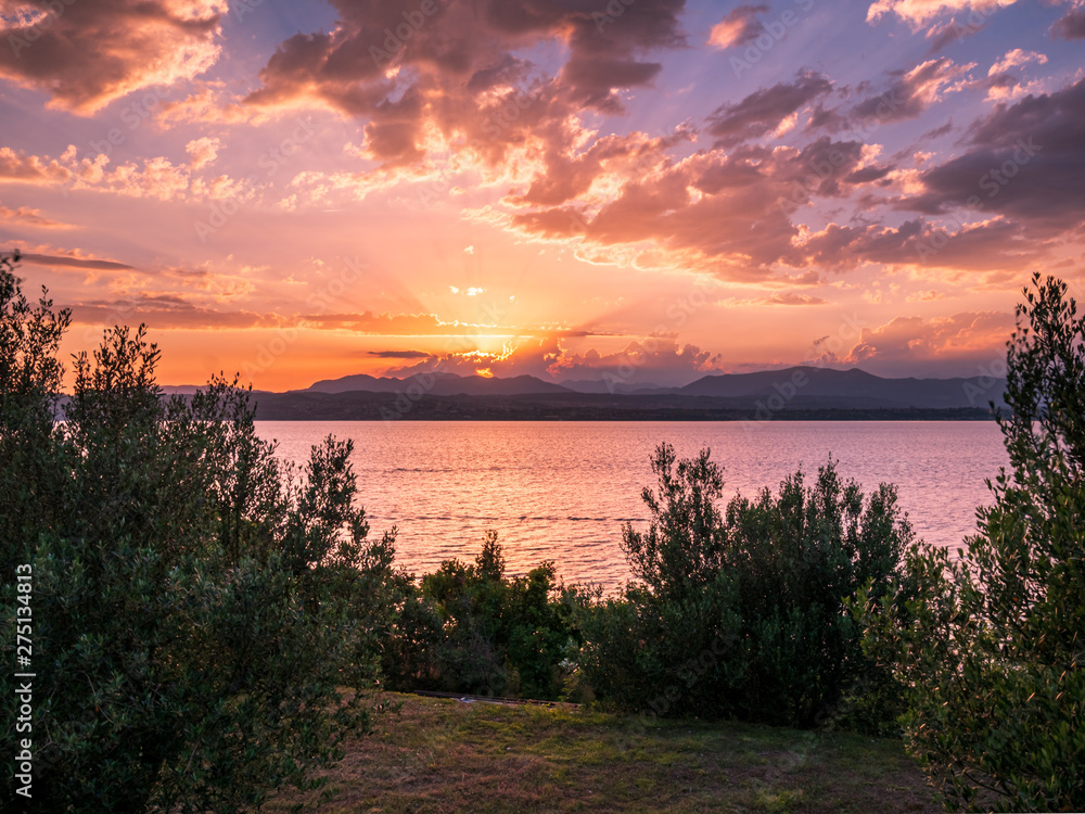 Lake Gardasee Water view during Summer vacation time with a mediterranean feeling