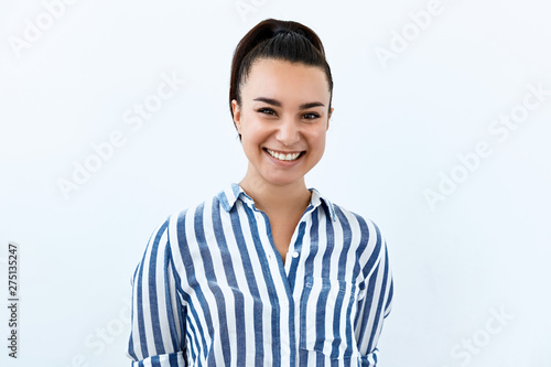 Tableau sur toile Beautiful brunette girl portrait against white background