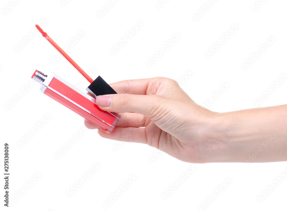 Red lip gloss beauty in hand on white background isolation Red lip gloss beauty in hand on white background isolation