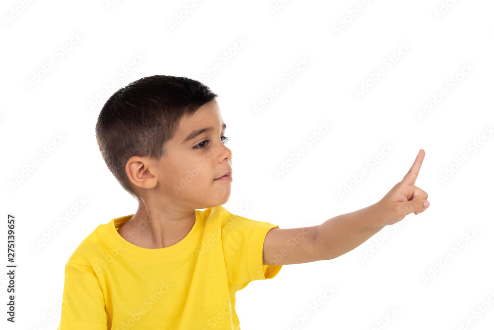 Gypsy child with yellow t-shirt pointing with the hand Gypsy child with yellow t-shirt pointing with the hand