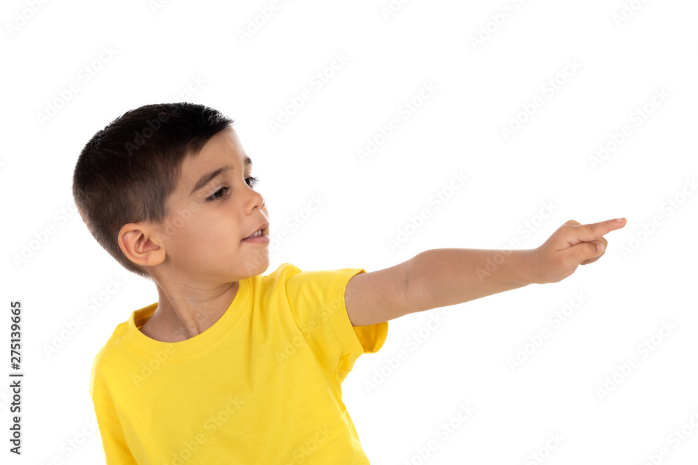Gypsy child with yellow t-shirt pointing with the hand Gypsy child with yellow t-shirt pointing with the hand