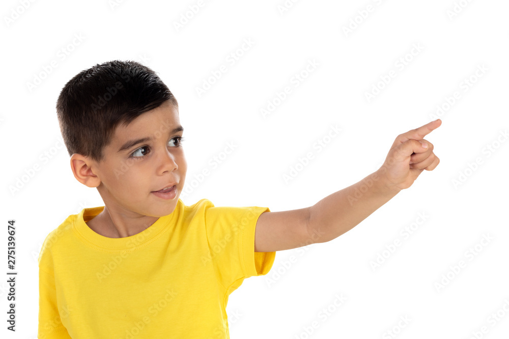Gypsy child with yellow t-shirt pointing with the hand Gypsy child with yellow t-shirt pointing with the hand