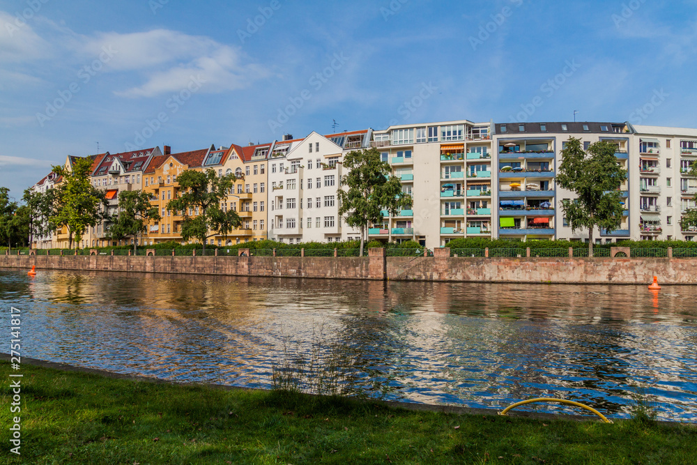 River Spree and Bonhoefferufer street buildings in Berlin, Germany