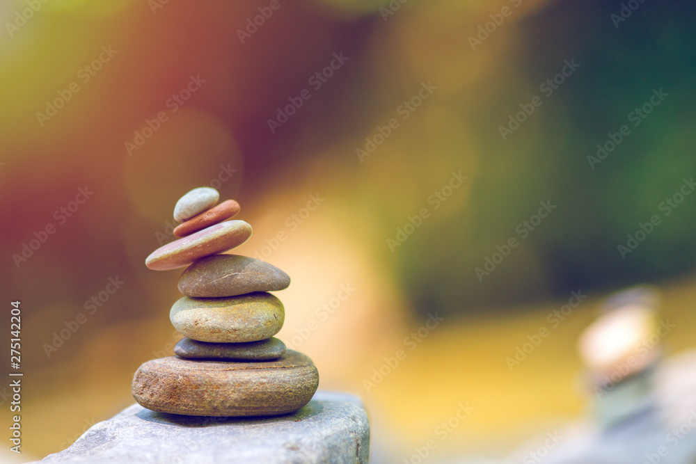 Obraz premium stack of zen stones on pebble beach