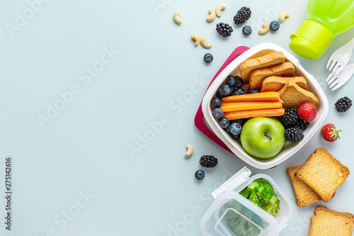 Healthy lunch to go packed in lunch box photo