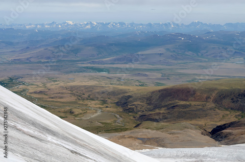 Altai mountainous landscape. View at Ukok Plateau (Russia) from Malchin Peak (Mongolia).