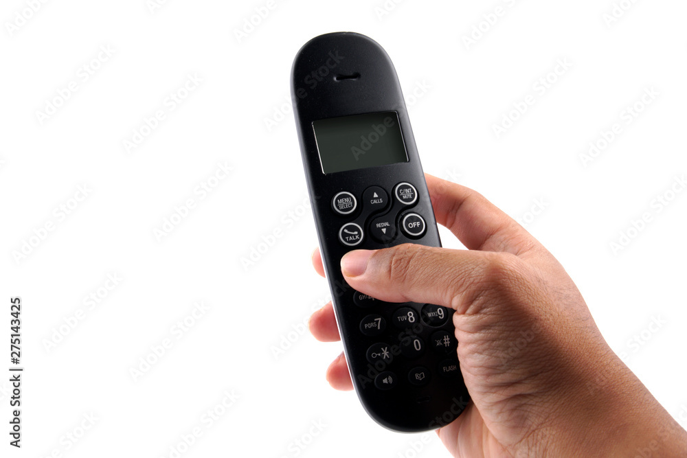 Hand holding home or office telephone with line on white background Hand holding home or office telephone with line on white background