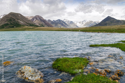 Western Mongolia mountainous landscape. Alpine lake. Altai Tavan Bogd National Park, Bayan-Ulgii Province, Mongolia.