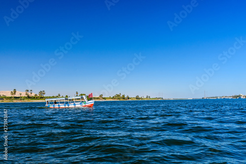 Tourist boat on the Nile river in Luxor, Egypt © ihorbondarenko