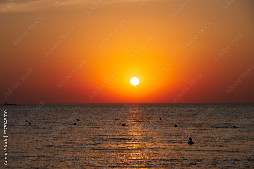 Bright sky and water at sunset over Black sea of Anapa, Krasnodar region, Russia Bright sky and water at sunset over Black sea of Anapa, Krasnodar region, Russia