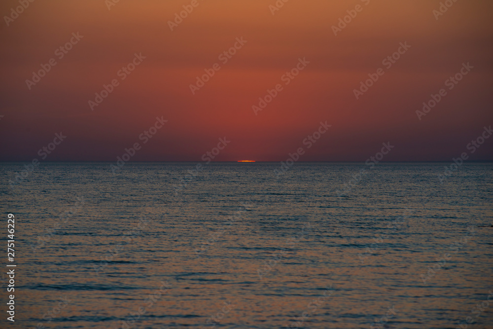 Bright sky and water at sunset over Black sea of Anapa, Krasnodar region, Russia Bright sky and water at sunset over Black sea of Anapa, Krasnodar region, Russia
